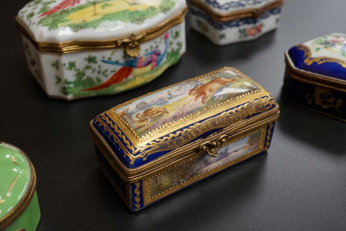 A collection of Continental hand painted and enamelled patch boxes, largest 9cm wide